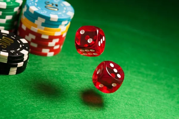 Live casino table with dealer and players